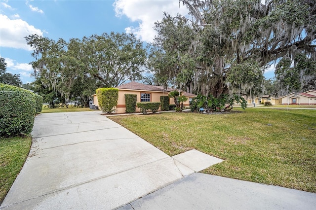 view of front of house with a front lawn