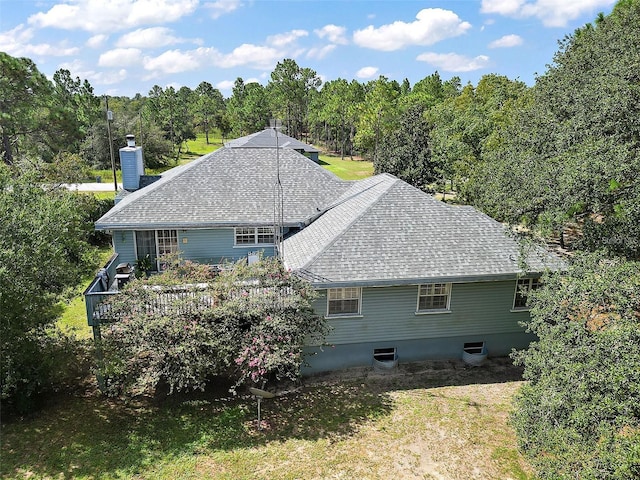 back of house with a yard, cooling unit, and a wooden deck