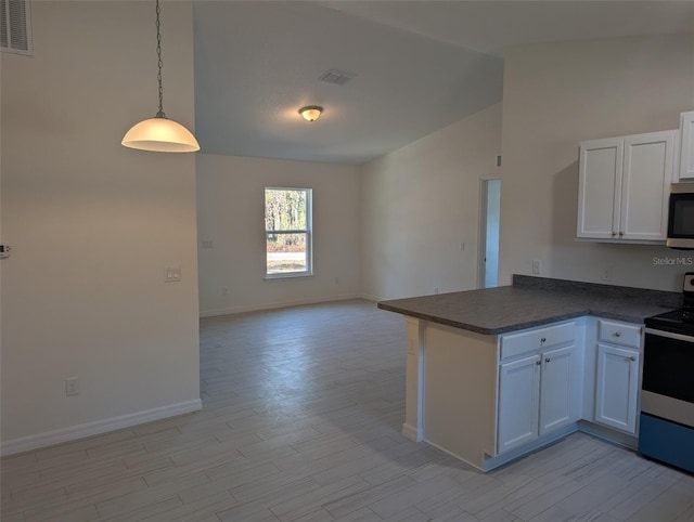 kitchen with kitchen peninsula, electric range, decorative light fixtures, and white cabinetry