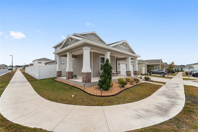 view of front facade with a porch and a front lawn