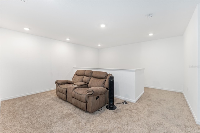 sitting room with light colored carpet