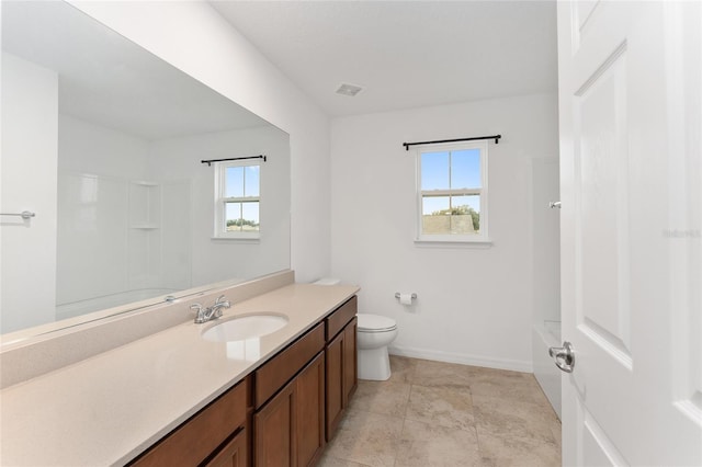 bathroom with vanity and toilet