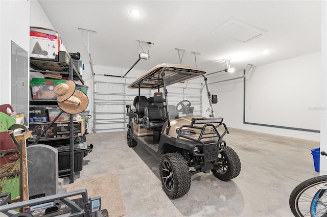 garage featuring a garage door opener