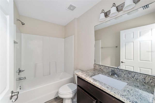 full bath featuring shower / bathing tub combination, visible vents, toilet, and vanity