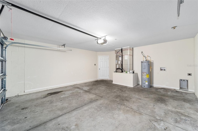 garage with water heater, a garage door opener, and baseboards