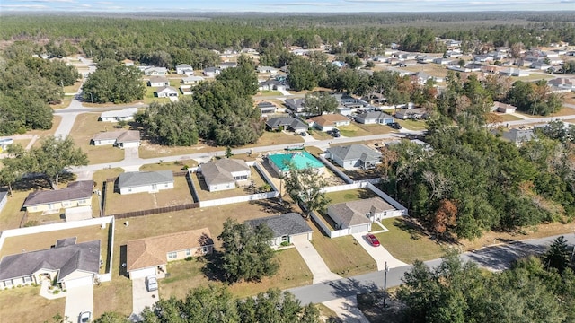 birds eye view of property with a residential view