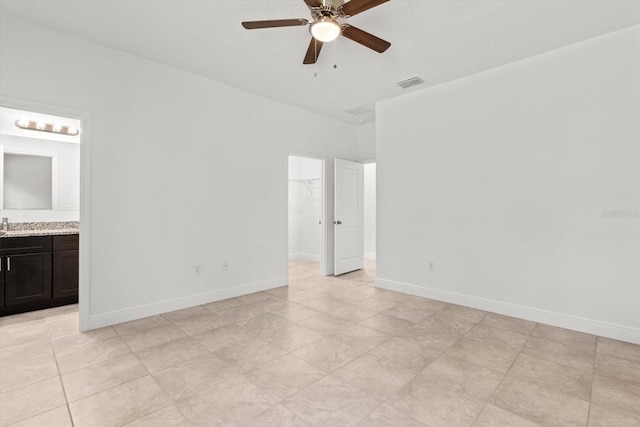 empty room featuring ceiling fan