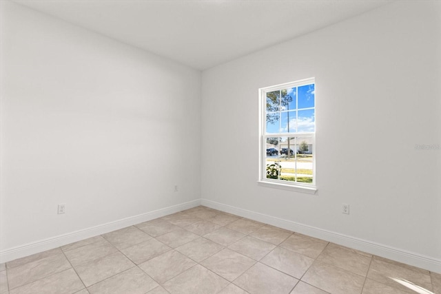 view of tiled spare room