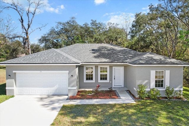 ranch-style house with a garage and a front yard