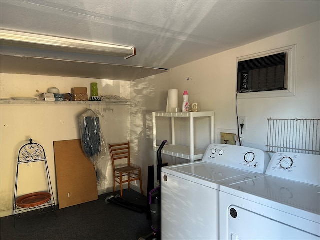 laundry area featuring washing machine and clothes dryer