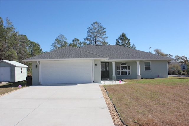 single story home featuring a front yard and a garage