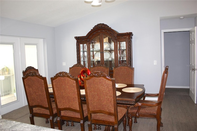 dining room with wood-type flooring