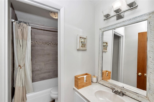 full bathroom featuring shower / bath combo, toilet, and vanity