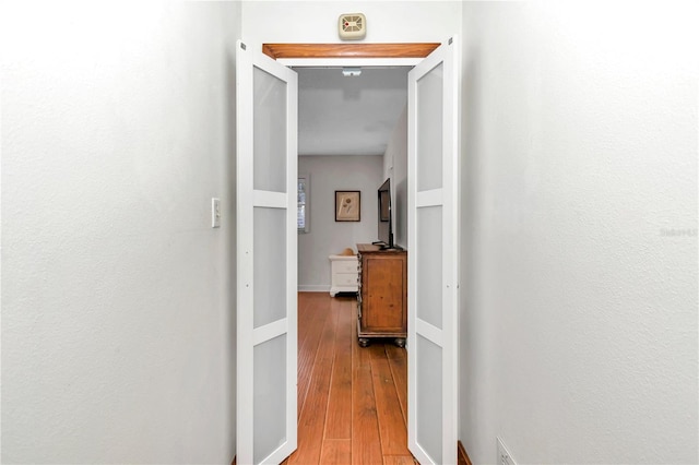 hallway featuring light wood-type flooring