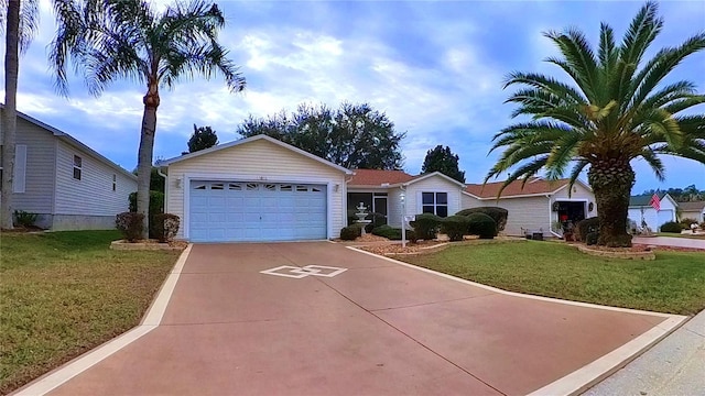 single story home featuring a front lawn and a garage