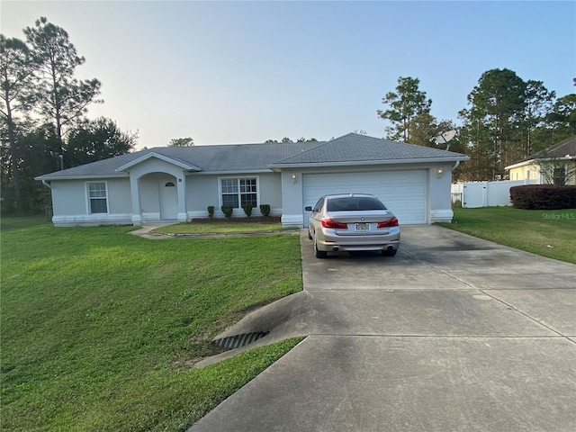 ranch-style house with a front lawn and a garage