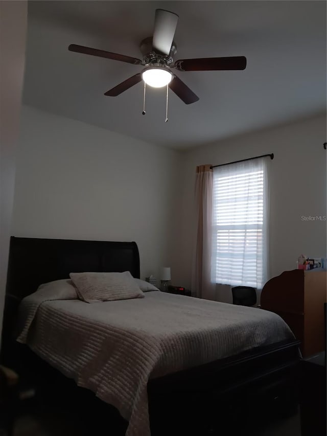 bedroom featuring ceiling fan