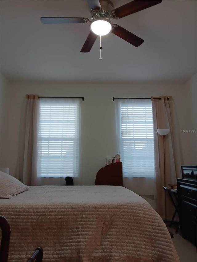 bedroom featuring ceiling fan