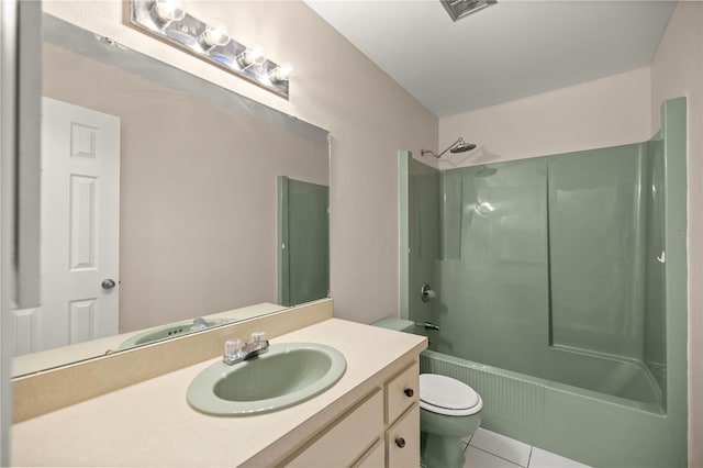 full bathroom featuring toilet, vanity, tile patterned flooring, and washtub / shower combination