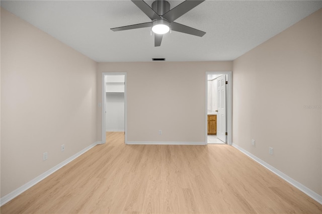 3856 NE 19th Street Cir, Ocala, FL 34470 - spare room featuring visible vents, a ceiling fan, light wood finished floors, and baseboards