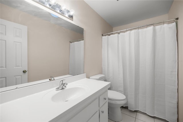 3856 NE 19th Street Cir, Ocala, FL 34470 - bathroom with vanity, tile patterned floors, and toilet