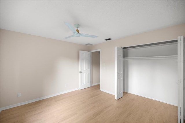 3856 NE 19th Street Cir, Ocala, FL 34470 - unfurnished bedroom with visible vents, a closet, baseboards, ceiling fan, and light wood finished floors