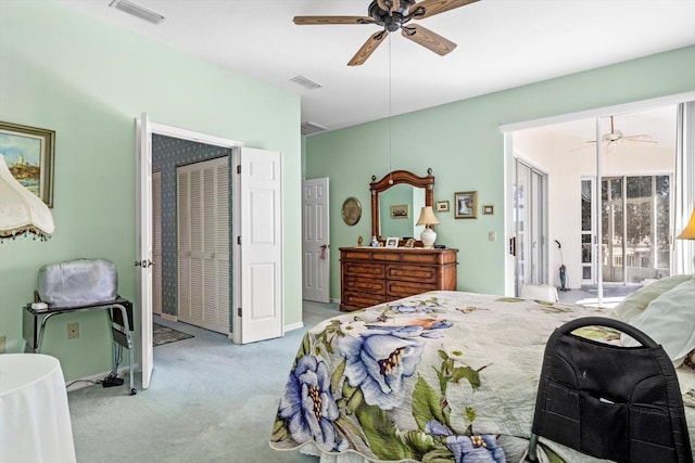 carpeted bedroom with ceiling fan and access to exterior