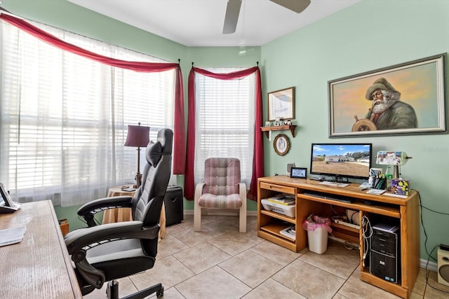 home office with ceiling fan and light tile patterned flooring