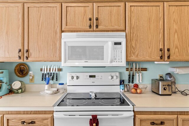 kitchen featuring white appliances