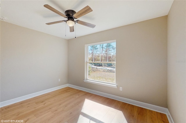 unfurnished room featuring light hardwood / wood-style floors and ceiling fan