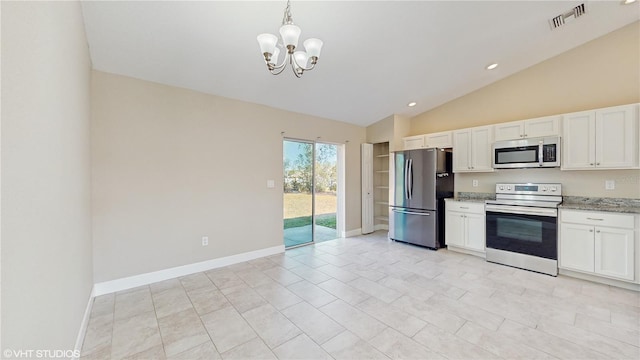 kitchen featuring stainless steel appliances, lofted ceiling, light stone countertops, pendant lighting, and white cabinets