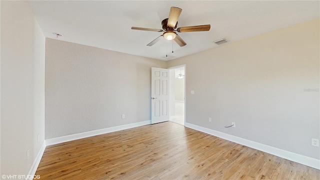 unfurnished room with ceiling fan and light hardwood / wood-style flooring