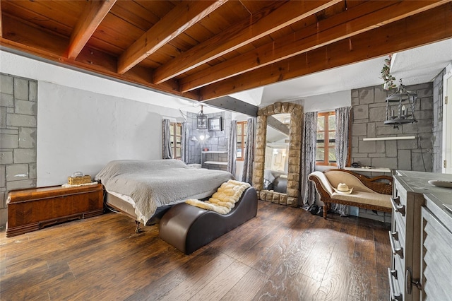 bedroom with beamed ceiling, wood ceiling, and hardwood / wood-style floors