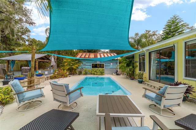 outdoor pool with a patio