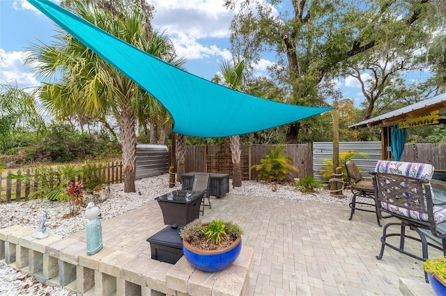 view of patio featuring outdoor dining space and fence private yard