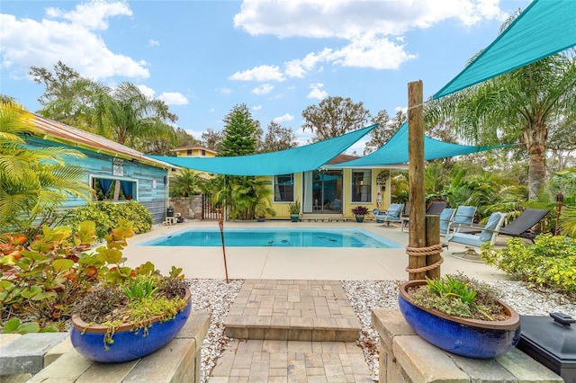 pool featuring a patio area