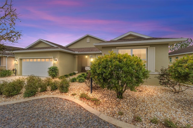 view of front of home with a garage