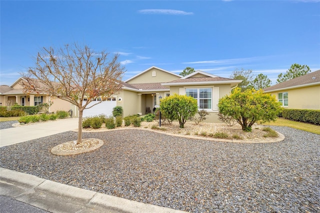 ranch-style house featuring a garage