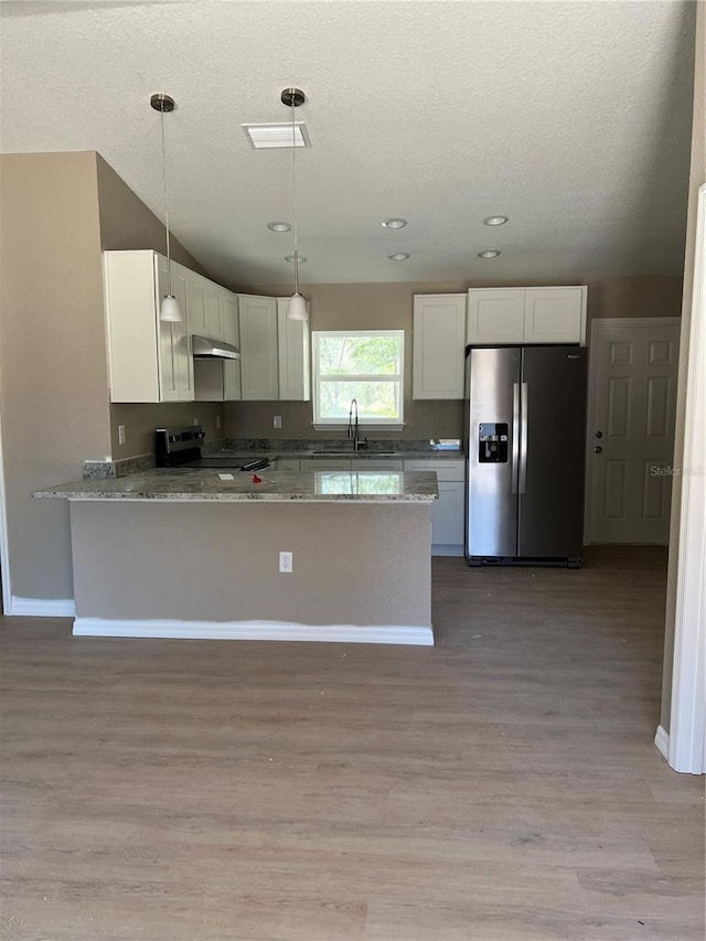 kitchen featuring decorative light fixtures, white cabinetry, light stone counters, kitchen peninsula, and stainless steel appliances