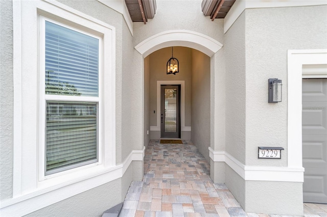 property entrance with a garage