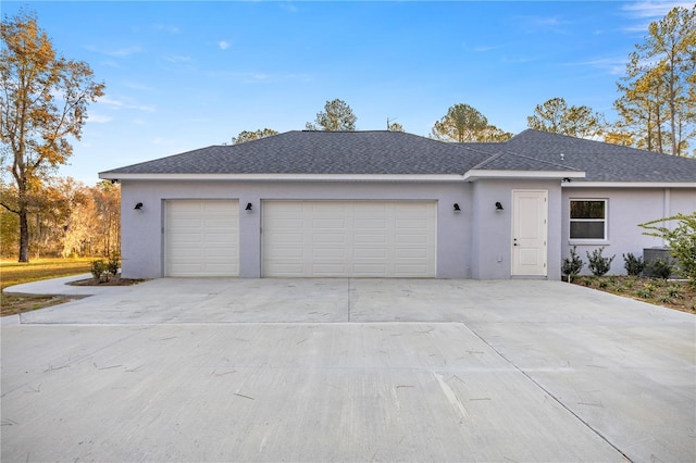 ranch-style home with a garage