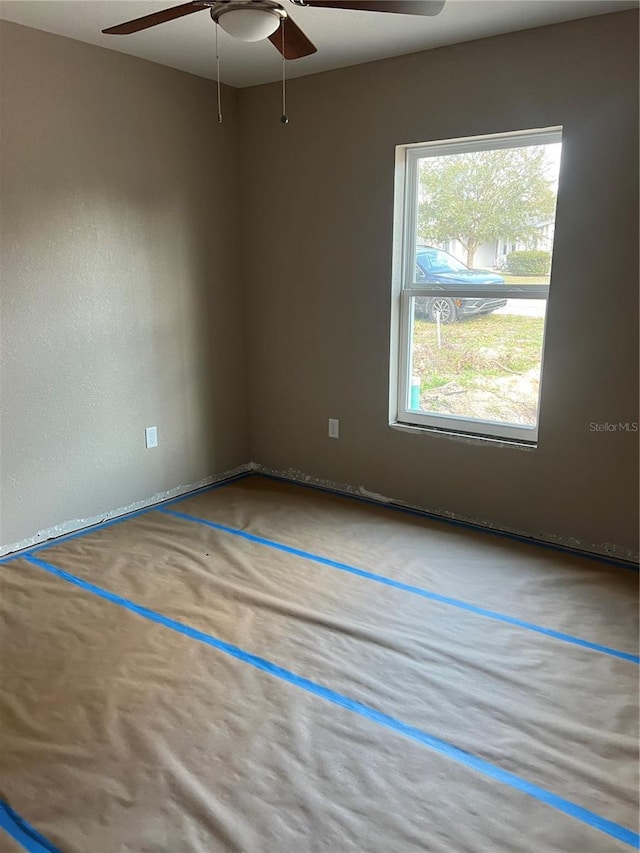 empty room with ceiling fan