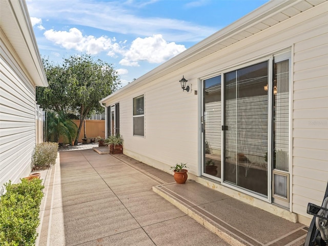 view of patio / terrace featuring fence