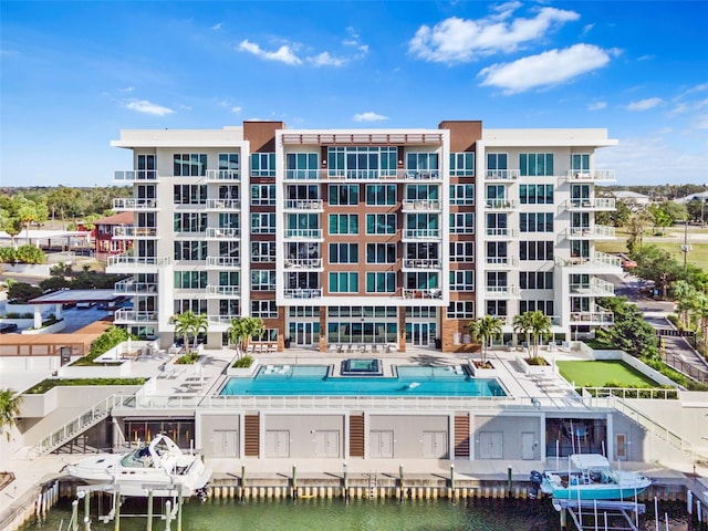 view of property with a water view