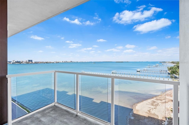 balcony featuring a water view