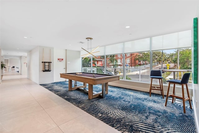 playroom featuring a chandelier, tile patterned floors, and pool table