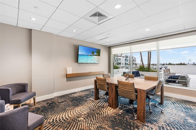 view of carpeted dining area