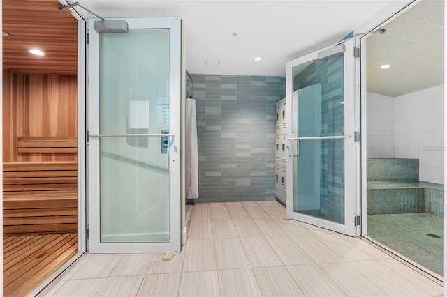 bathroom featuring tile walls