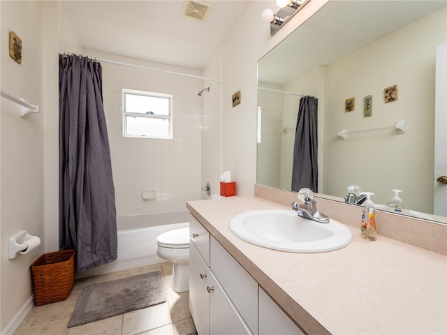 full bathroom featuring vanity, tile patterned floors, toilet, and shower / bath combo with shower curtain