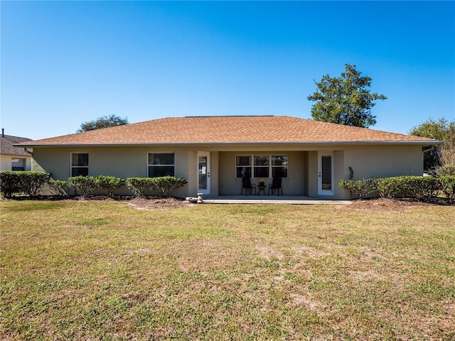 ranch-style home with a patio area and a front yard